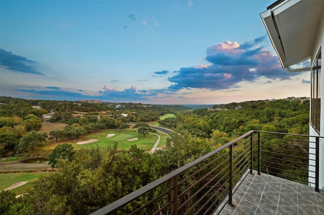 view of balcony at dusk