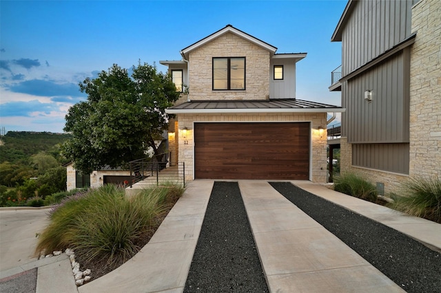 view of front of home featuring a garage