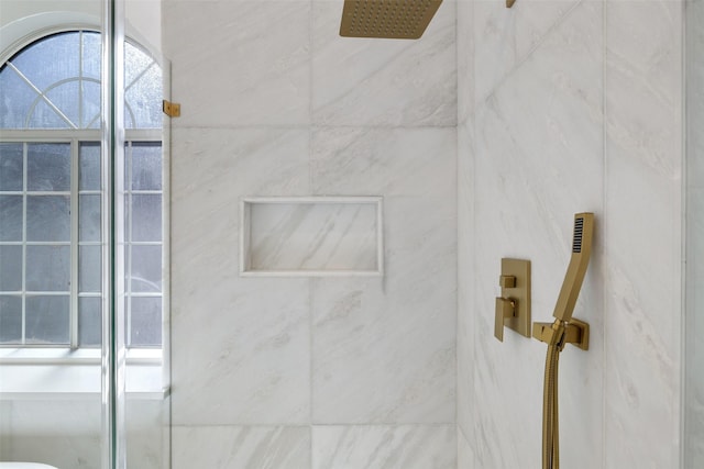 room details with a tile shower