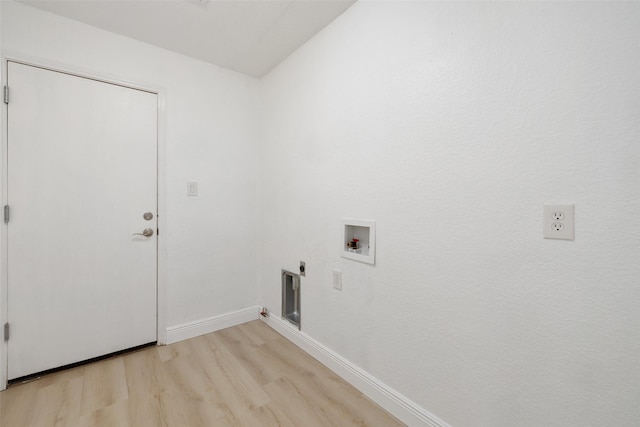 washroom featuring washer hookup, light hardwood / wood-style flooring, electric dryer hookup, and gas dryer hookup