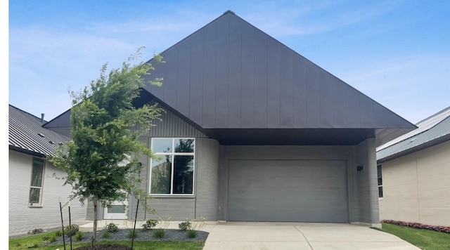 modern farmhouse style home featuring a garage