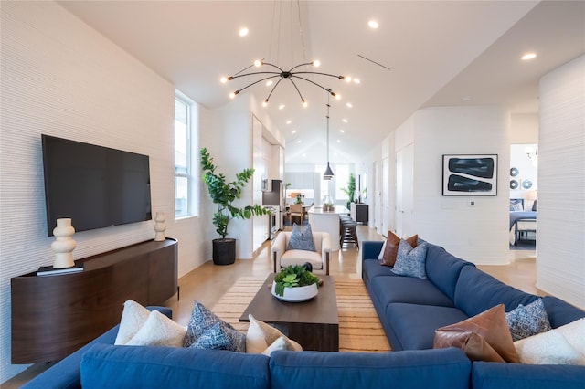 living room featuring a notable chandelier