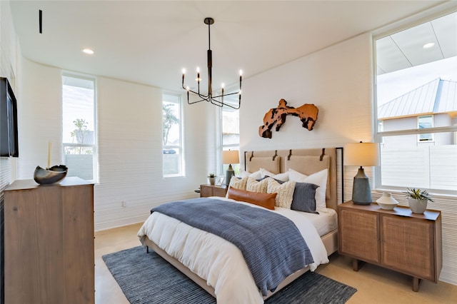 bedroom featuring a chandelier