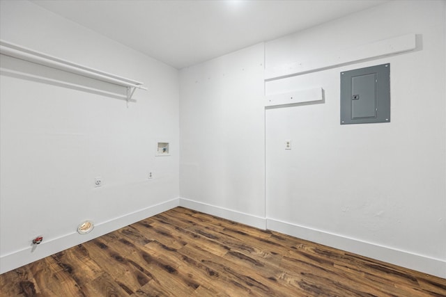 laundry area with gas dryer hookup, hookup for a washing machine, electric panel, and dark hardwood / wood-style floors