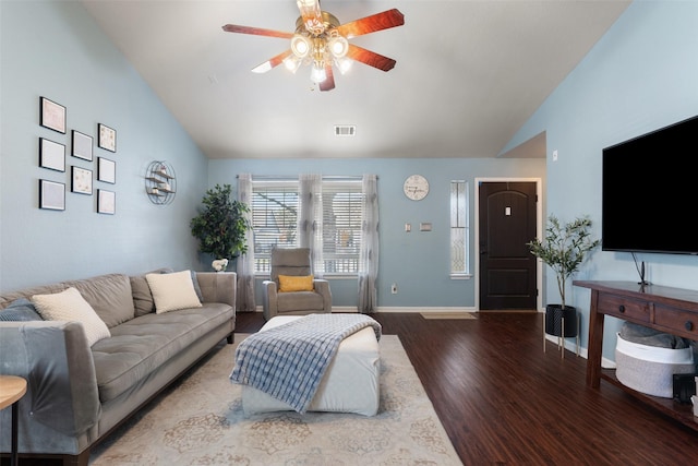 living room with hardwood / wood-style flooring, ceiling fan, and lofted ceiling