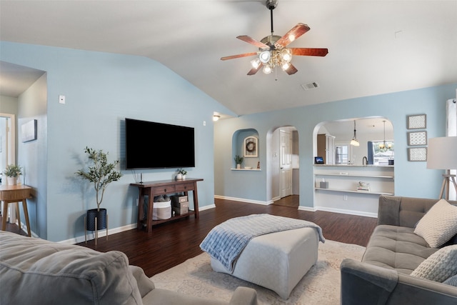 living room featuring ceiling fan, hardwood / wood-style floors, and lofted ceiling