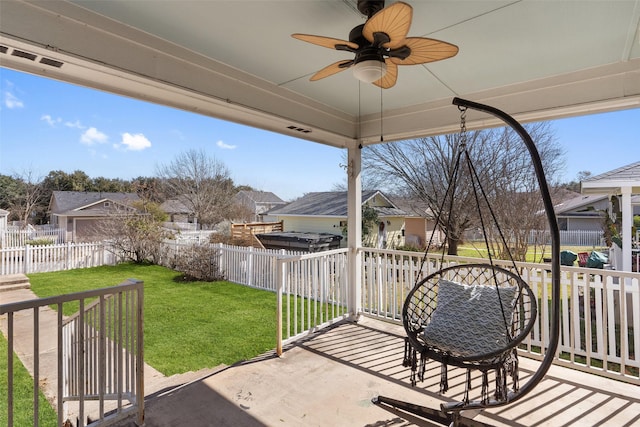 view of patio / terrace featuring ceiling fan