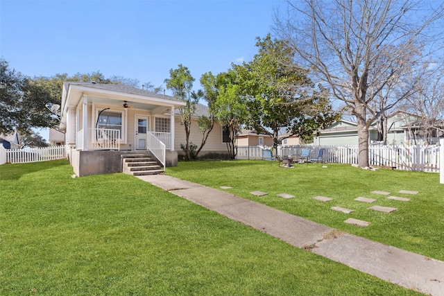 view of front of property featuring covered porch and a front yard