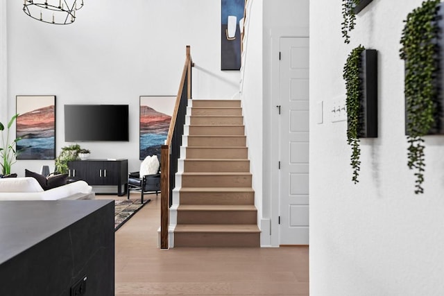 staircase featuring hardwood / wood-style flooring