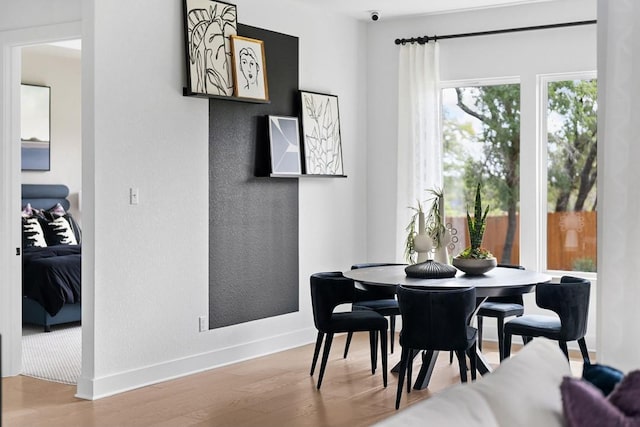 dining room featuring light wood-type flooring