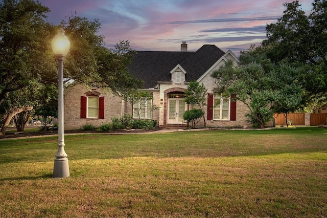 127 Roberts Cir, Georgetown, TX 78633 - view of front facade featuring a chimney