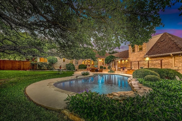 127 Roberts Cir, Georgetown, TX 78633 - pool at dusk featuring a patio