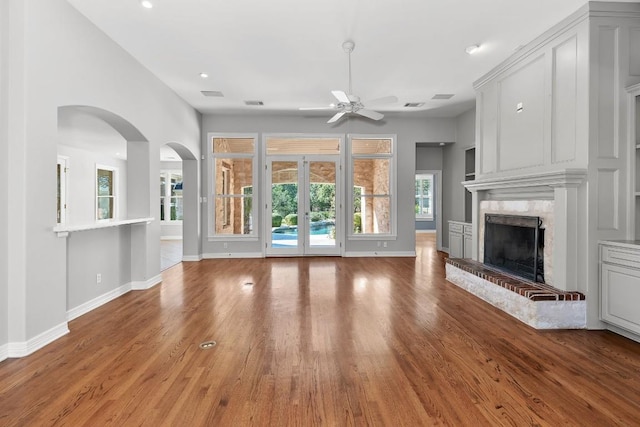 127 Roberts Cir, Georgetown, TX 78633 - unfurnished living room featuring ceiling fan, baseboards, wood finished floors, and recessed lighting