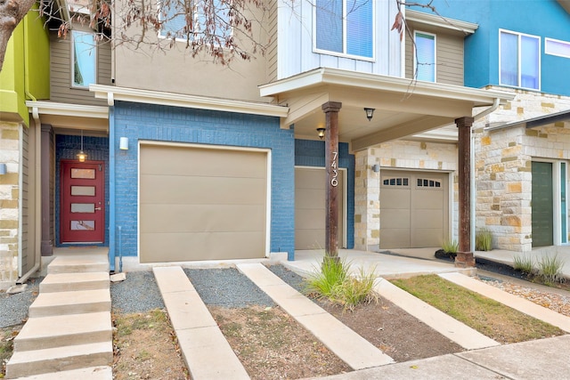 view of exterior entry featuring a garage