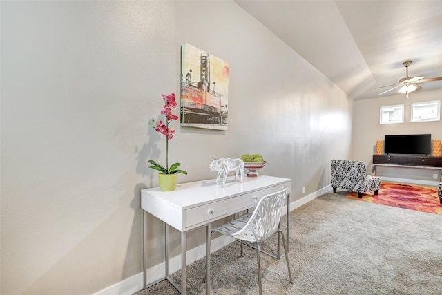 office featuring carpet floors, ceiling fan, and vaulted ceiling