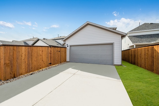 detached garage with fence