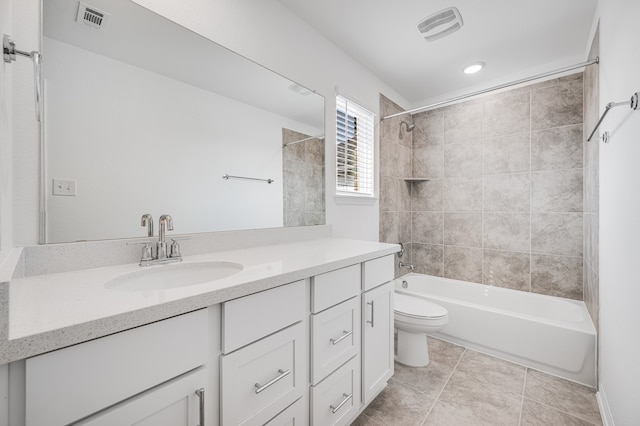 full bath featuring toilet, bathing tub / shower combination, vanity, and visible vents