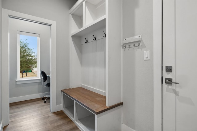 mudroom with light hardwood / wood-style flooring