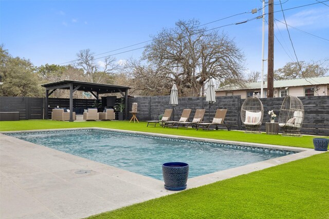 view of swimming pool with a gazebo, outdoor lounge area, and a yard