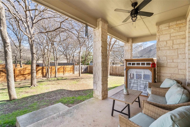 view of patio / terrace featuring ceiling fan