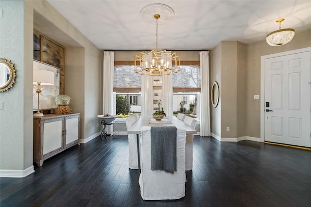 dining room with baseboards, dark wood-style flooring, and an inviting chandelier