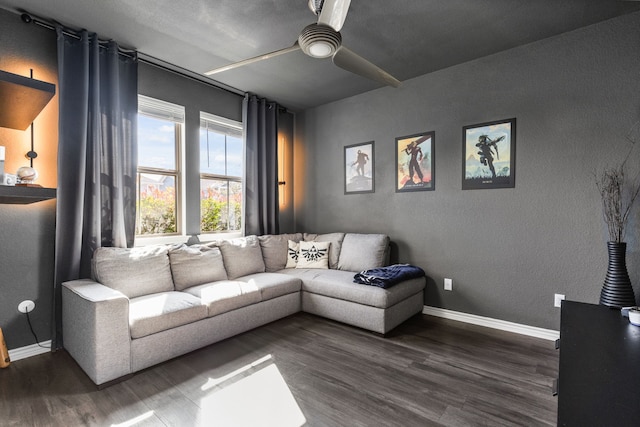 living room with ceiling fan and wood-type flooring