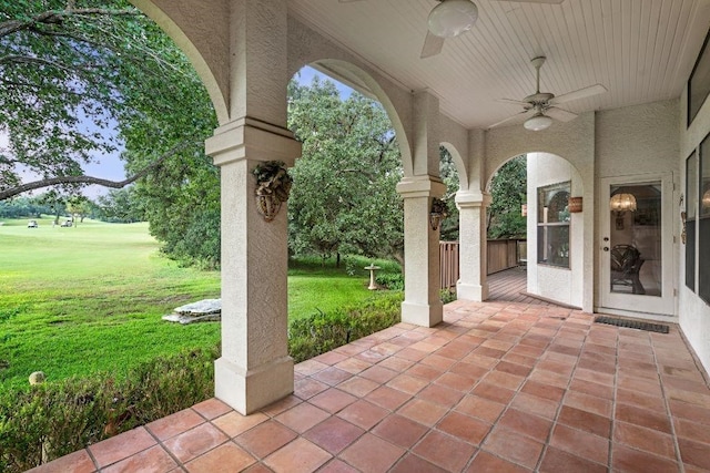 view of patio featuring ceiling fan