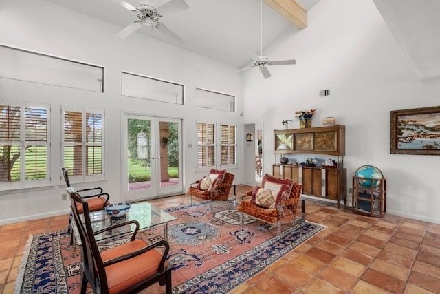 interior space with beamed ceiling, french doors, high vaulted ceiling, tile patterned floors, and ceiling fan