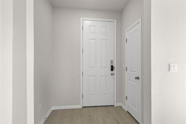 doorway to outside featuring light hardwood / wood-style floors