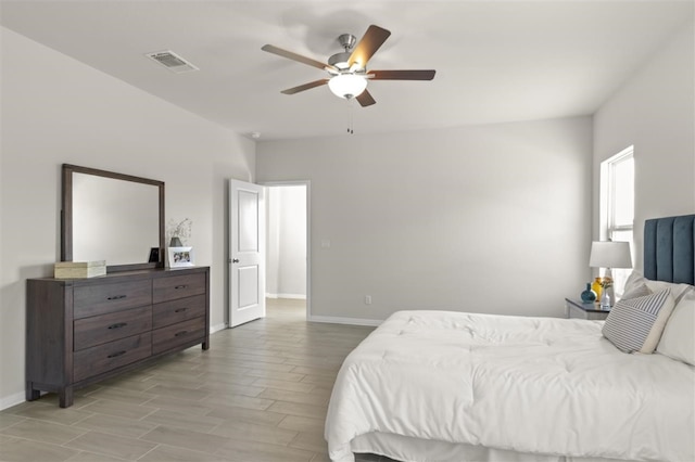 bedroom featuring ceiling fan and light wood-type flooring