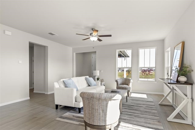 308 Yellowstone Dr, Kyle, TX 78640 - interior space with baseboards, ceiling fan, visible vents, and wood finished floors