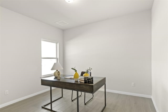 308 Yellowstone Dr, Kyle, TX 78640 - home office featuring baseboards and light wood finished floors