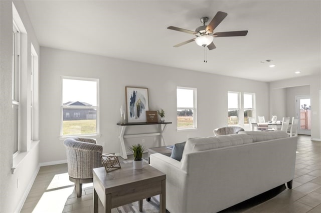 308 Yellowstone Dr, Kyle, TX 78640 - living room featuring recessed lighting, a ceiling fan, and baseboards