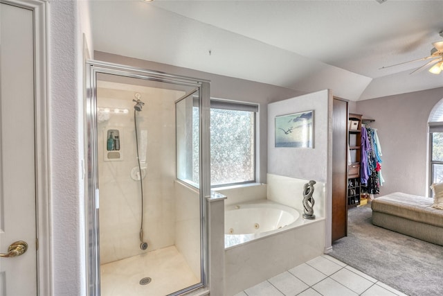 bathroom with independent shower and bath, vaulted ceiling, tile patterned floors, and ceiling fan