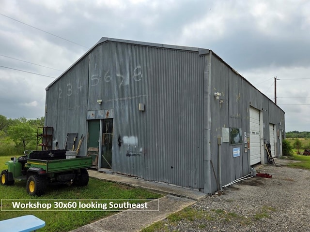 view of outbuilding with a garage