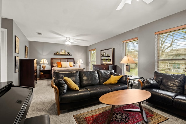 carpeted bedroom featuring ceiling fan