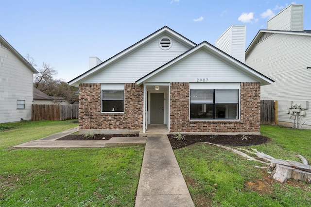 bungalow featuring a front yard