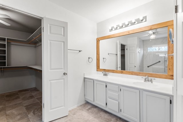 bathroom with vanity and ceiling fan