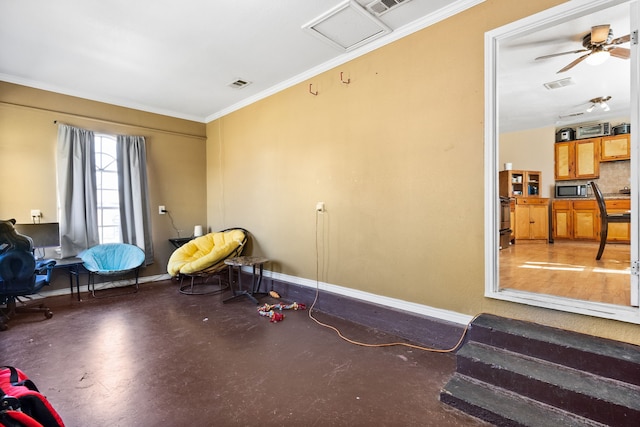 interior space featuring ceiling fan and ornamental molding