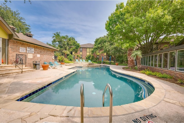 view of pool with a patio area