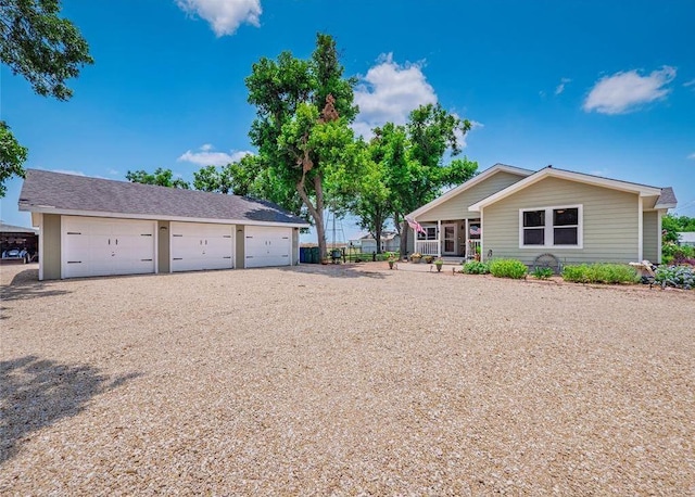 ranch-style home featuring a garage