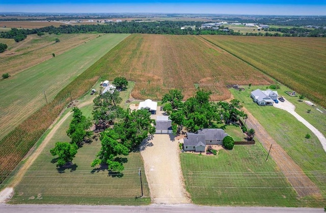 birds eye view of property featuring a rural view