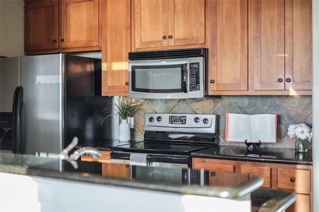 kitchen featuring backsplash and appliances with stainless steel finishes