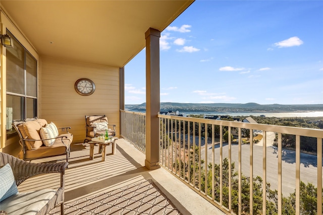 balcony featuring a mountain view