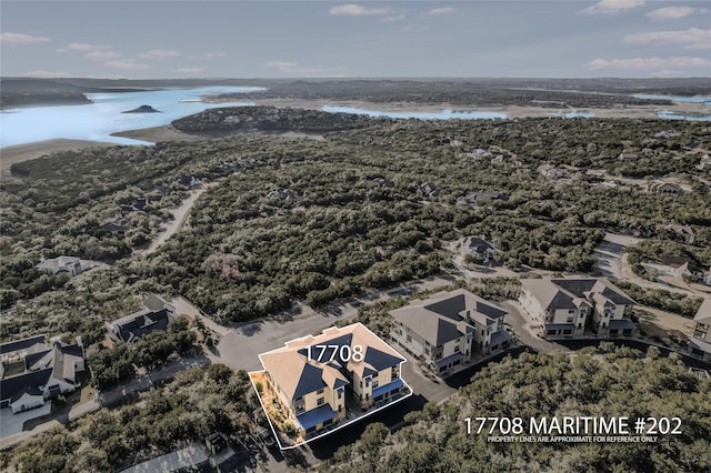 bird's eye view with a water view