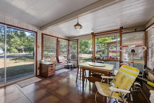 sunroom / solarium with plenty of natural light