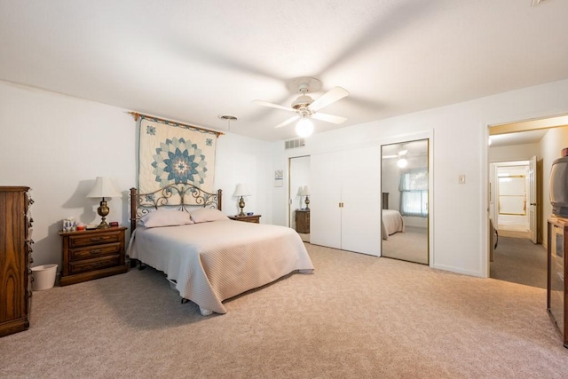 carpeted bedroom featuring ceiling fan