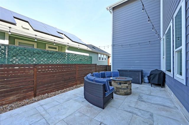 view of patio / terrace featuring an outdoor fire pit and area for grilling