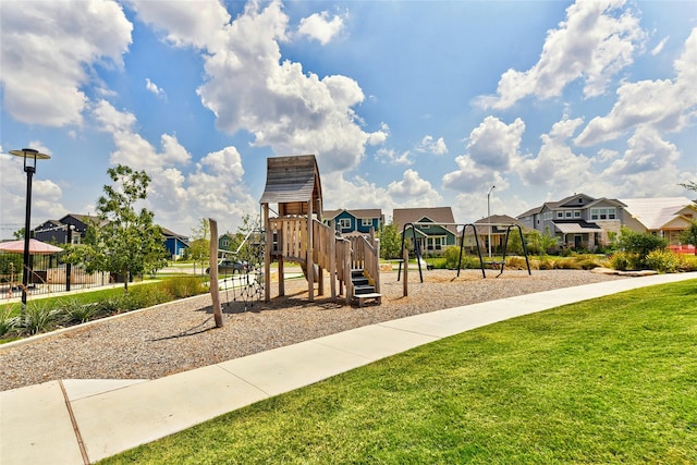 view of playground with a yard