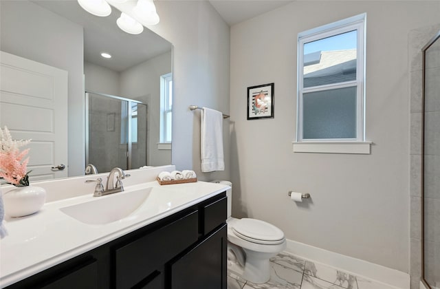 bathroom with a shower with door, toilet, and vanity